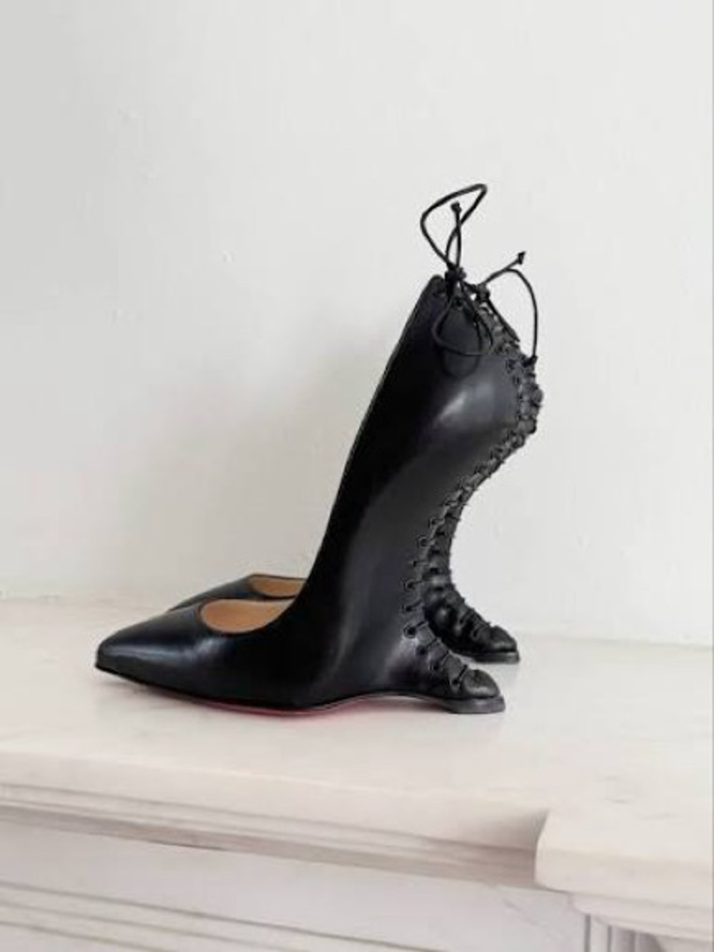 ISO Christian Louboutin Conquilla Heels